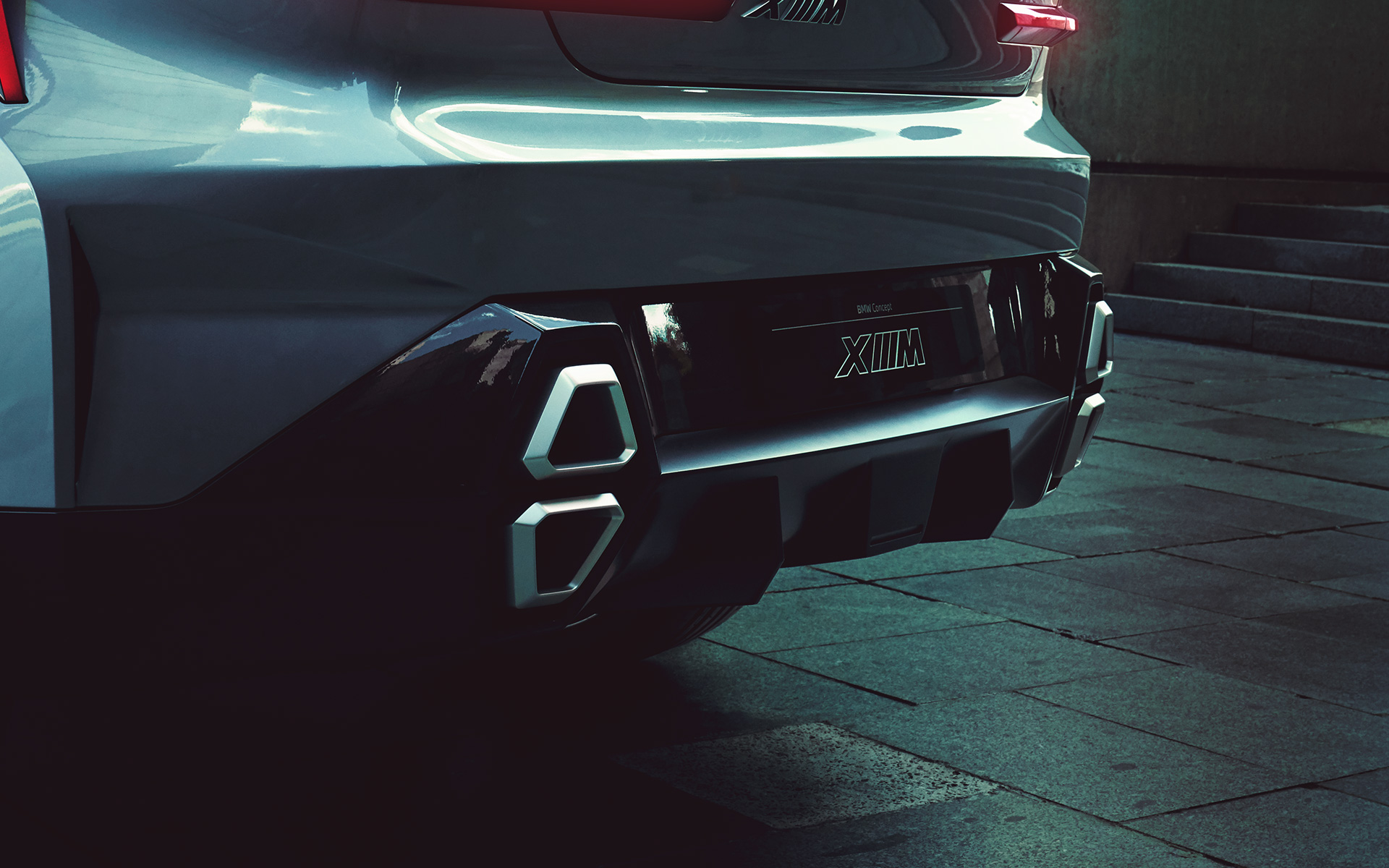 Concept BMW XM (G09), perspetiva traseira a três quartos, parado, grande plano, ponteiras de escape Concept BMW XM (G09), perspetiva traseira a três quartos, parado, grande plano, ponteiras de escape